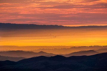 Wall Mural - San Francisco bay and San Mateo bridge at sunset as seen from the Mt Diablo summit, Mt Diablo State Park, Contra Costa county, San Francisco bay area, California