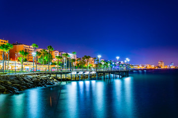 Wall Mural - Night view of Molos promenade with several piers leading to the mediterranean sea in Limassol, Cyprus