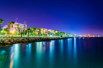 Wall Mural - Night view of Molos promenade with several piers leading to the mediterranean sea in Limassol, Cyprus