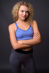 Wall Mural - Young beautiful sport woman ready for gym