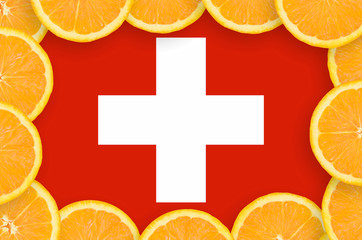 switzerland flag in fresh citrus fruit slices frame