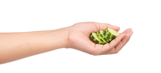 hand holding cucumber isolated on white background