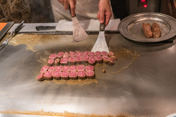 Wall Mural - Japanese cuisine: Kobe beef steak in the hot pan