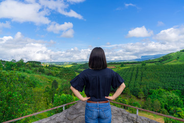 Happy young cute asian Japanese girl hipster backpack  women travelling looking at beautiful sky mountains scenery views 