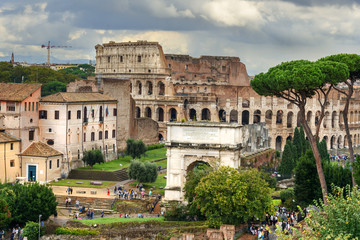 Wall Mural - Colosseum and Ruins of Roman Forum. Arch of Titus and others. Rome. Italy