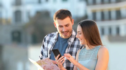 Sticker - Two excited tourists finding booking offers on a smart phone