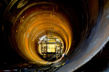View On The Interior Of One Of The Main Penstock Of An Hydroelectric Powerplant During The Wielding Process; This Penstock Is Over 6 Meters In Diameter.
