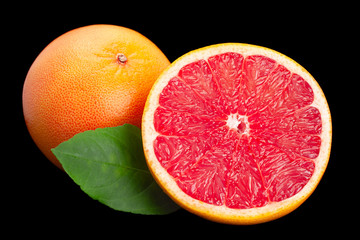 Wall Mural - Grapefruit slice with leaf