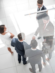 business background.handshake business men in the business center