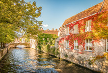 Beautiful Canal And Traditional Houses In The Town Of Bruges, Belgium.