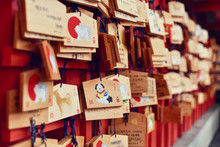 Wishes Tied To Nails On Wooden Board At Temple