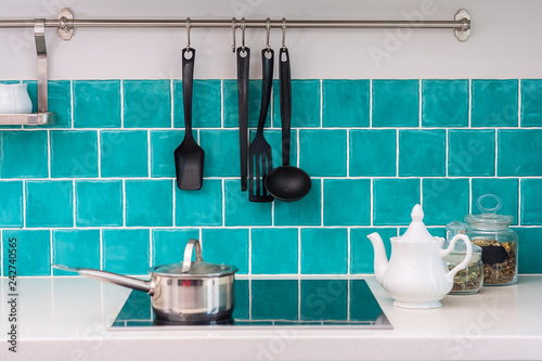 Kitchen Features Dark Gray Flat Front Cabinets Paired With White