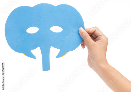 Fotografija hand holding elephant carnival mask isolated on white background