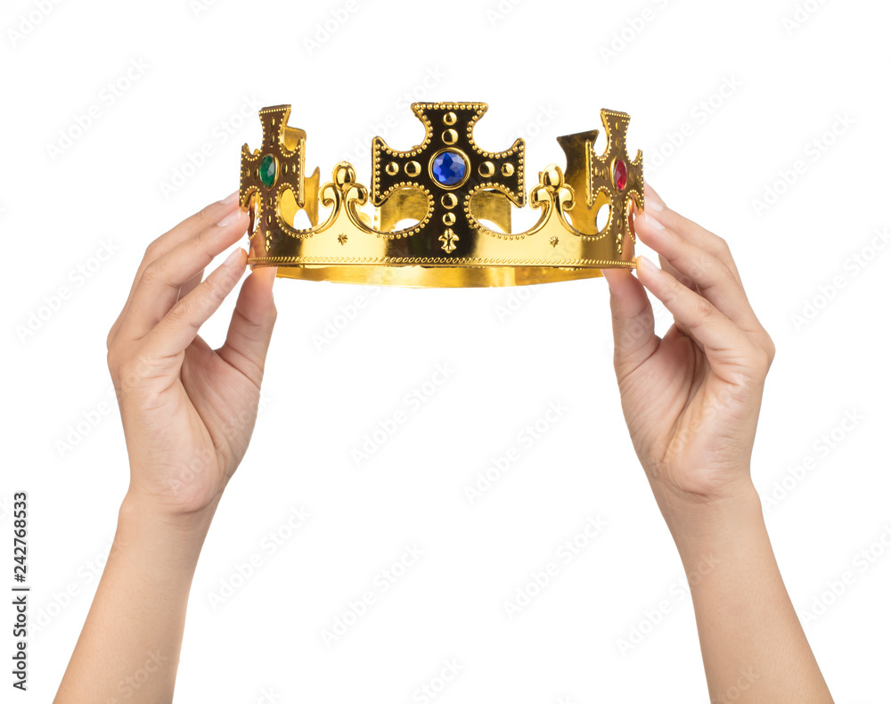 Hand holding crown golden isolated on a white background Stock Photo ...