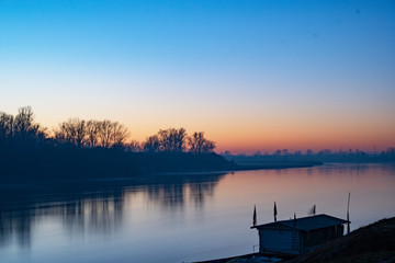 Wall Mural - Sunset on the Po river - Cremona, Italy
