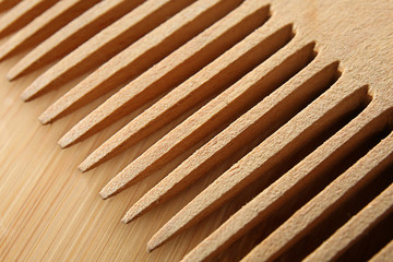 Wall Mural - Wooden hair comb, closeup