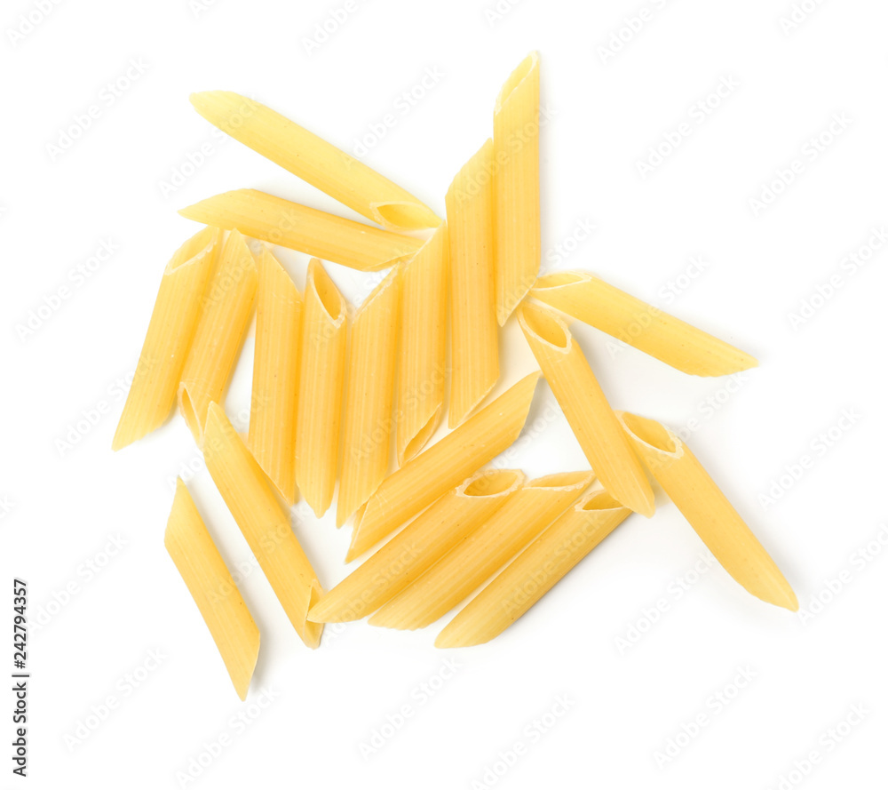 Uncooked penne pasta on white background