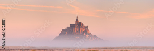 Le Mont Saint Michel in Normandy, France at sunrise Fotobehang