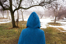 Young Woman In Retro Blue Coat Walk In The Foggy Park In The Winter Times, Snow And Trees Background,fantasy Or Fairy Concept
