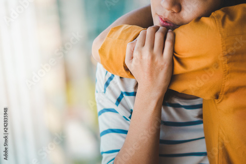 Fotomural Young depressed asian woman hug her friend for encouragement, Selective focus, PTSD Mental health concept