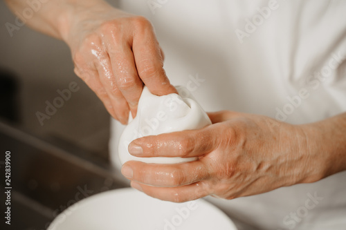 Fotomural production of mozzarella and cheese in the dairy. Dairy products.
