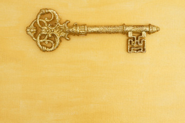 Hand painted distressed gold with golden key background