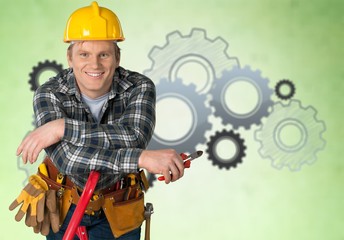 Canvas Print - Construction worker with tools in empty building