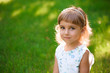 © nagaets - Portrait of a beautiful young little girl in summer park