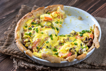 Canvas Print - Seafood pie with saffron cream sauce