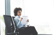 © focusandblur - Capable confident businesswoman with her resume in waiting room