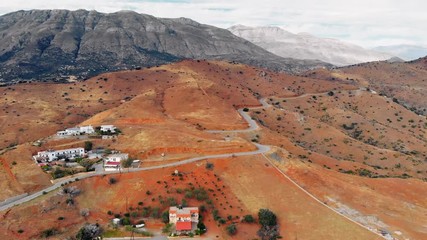 Wall Mural - Aerial view of small town on mountain