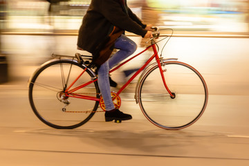 Wall Mural - bicycle rider in the city at night