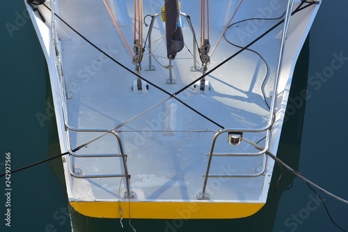 Fotografía Stern of composite racing sailing ship with stainless steel pushpit and some rigging visible