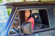 © javiindy - Young Arab woman driving an old van in nature