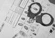 © New Africa - Police handcuffs and criminal fingerprints card, top view