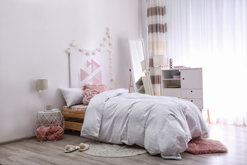 modern teenager room interior with comfortable bed