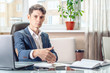 © Artem - Official businessman sitting at workplace in office refuses bribes. Concept of corruption and bribery
