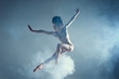 © Monstar Studio - Dancing in cloud concept. Muscle brunette beauty female girl adult woman dancer athlete in dust / fog. Girl wearing dance bodysuit jumping in mid air, performance on isolated grey / black background