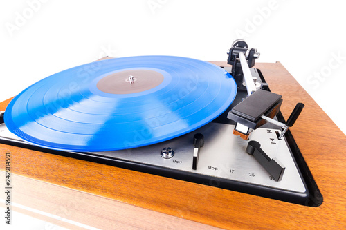 Fotografie, Obraz Vintage turntable with a blue vinyl isolated on white