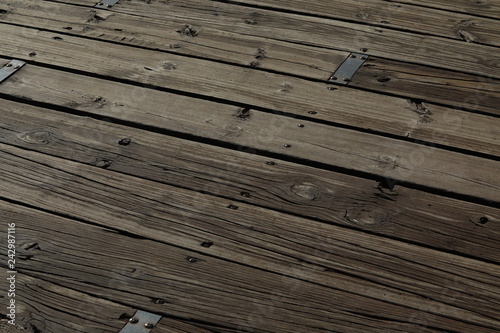 Fotografiet Parquet that lies horizontally and gleams the sun.