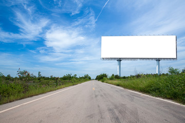 blank billboard on the sideway in the park. image for copy space, advertisement, text and object. white billboard in natural green.