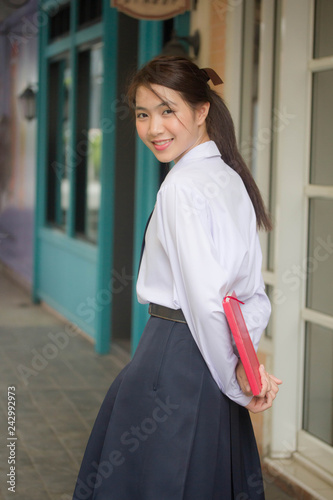 Fotografie, Obraz Portrait of thai high school student uniform teen beautiful girl happy and relax