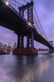 Fototapeta  - Manhattan Bridge view at night from East river with long exposure