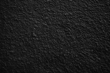 Poster - dark black surface of the snow or plastered wall, dark background of fresh snow texture in black and white