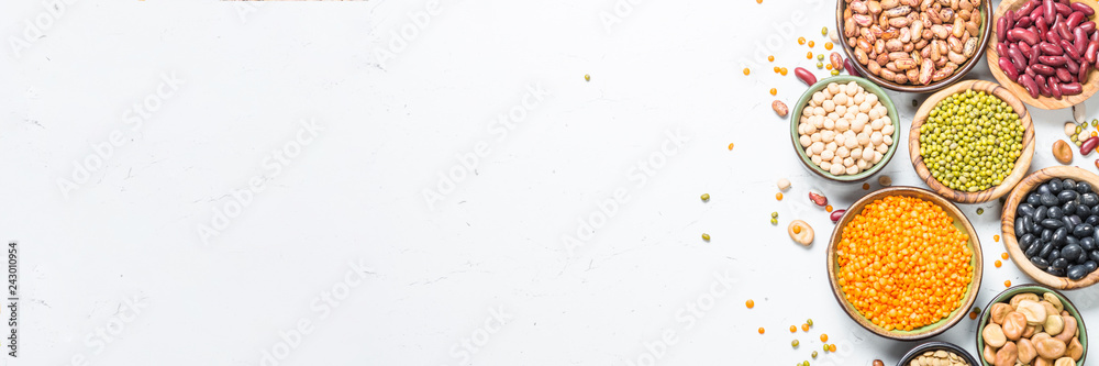 Legumes, lentils, chikpea and beans assortment on white. - obrazy, fototapety, plakaty 
