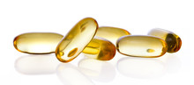 Close Up Of Food Supplement Oil Filled Capsules Suitable For: Fish Oil; Omega 3; Omega 6; Omega 9; Evening Primrose; Borage Oil; Flax Seeds Oil; Vitamin A; Vitamin D; Vitamin D3; Vitamin E