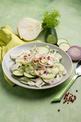 Wall Mural - fennel salad with cucumber onion and pink pepper