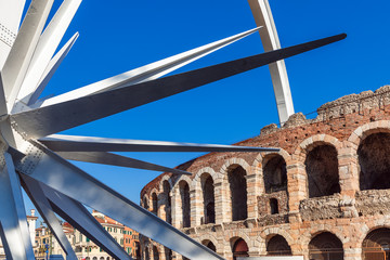 Wall Mural - Verona - Italy. January 6, 2019: Piazza Brà - the Arena, famous ancient roman amphitheatre (Arena di Verona) and the Verona Christmas star (urban decoration for Сhristmas)