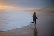 © rushay - Woman running on the beach