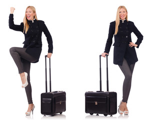 Beautiful woman in black coat with suitcase 